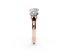 Round Cut Diamond Three-Stone Ring Set in Rose gold with Channel-Set Band and Prong Settings