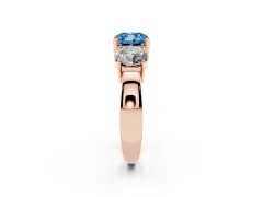 Fancy Blue Cushion Cut Diamond Three-Stone Ring Set in Rose gold with Round Side Stones and Classic Band