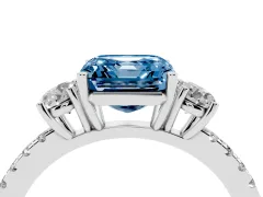 Fancy Blue Asscher Cut Diamond Three-Stone Ring Set in Platinum with Pavé Band and Graduated Sides