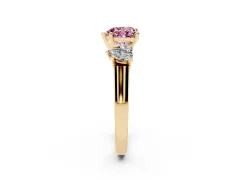 Fancy Pink Heart Cut Diamond Three-Stone Trellis Ring Set in Yellow gold with Comfort Fit Band