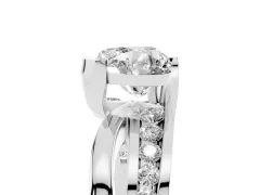 Heart Cut Diamond Solitaire Ring Set in White gold with Channel Set Split Shank and Tension Prongs
