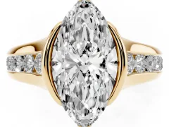 Marquise Cut Diamond Bezel-Set Solitaire Ring Set in Yellow gold with Channel-Set Band
