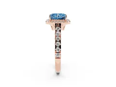 Fancy Blue Radiant Cut Diamond Halo Engagement Ring Set in Rose gold with Pavé Band and Prong-Set Center