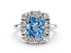 Fancy Blue Radiant Cut Diamond Halo Cluster Engagement Ring Set in Platinum with Polished Band and Prong Setting