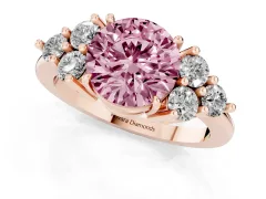 Fancy Pink Round Cut Diamond Solitaire Ring Set in Rose gold with Cluster Accents on Each Side