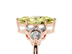 Fancy Yellow Marquise Cut Diamond Solitaire Ring Set in Rose gold with Cluster Accents on Each Side
