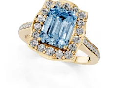 Fancy Blue Emerald Cut Diamond Halo Ring Set in Yellow gold with Pavé-Lined Shoulders and Prong Setting