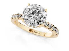 Round Cut Diamond Pavé Solitaire Ring Set in Yellow gold with Round Band Accents and Prong Setting