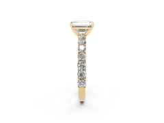 Emerald Cut Diamond Solitaire Ring Set in Yellow gold with Shared Prong Pavé Band