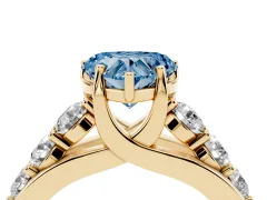 Fancy Blue Heart Cut Diamond Pavé Engagement Ring Set in Yellow gold with Prong Setting