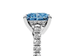 Fancy Blue Radiant Cut Diamond Solitaire Ring Set in Platinum with Brilliant Pavé Band and Prong Setting