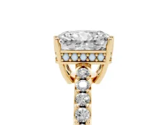 Radiant Cut Diamond Solitaire Engagement Ring Set in Yellow gold with Pavé Band and Prong Setting