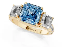 Fancy Blue Asscher Cut Diamond Three-Stone Ring Set in Yellow gold with Pavé Band