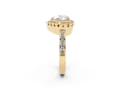 Heart Cut Diamond Halo Ring Set in Yellow gold with Pavé Shank and Prong Setting