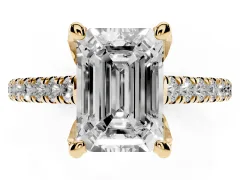 Emerald Cut Diamond Solitaire Ring Set in Yellow gold with Brilliant Pavé Band and Prong Setting