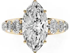 Marquise Cut Diamond Solitaire Ring Set in Yellow gold with Pavé-Set Band and Prong Setting