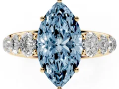 Fancy Blue Marquise Cut Diamond Solitaire Ring Set in Yellow gold with Pavé-Set Band and Prong Setting