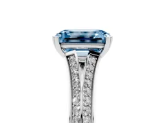 Fancy Blue Emerald Cut Diamond Split Shank Pavé Engagement Ring Set in Platinum with Prong-Set Center Stone