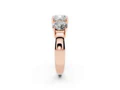 Cushion Cut Diamond Three-Stone Ring Set in Rose gold with Round Side Stones and Classic Band