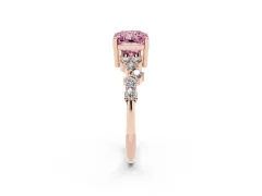 Fancy Pink Radiant Cut Diamond Ring Set in Rose gold with Scattered Round Accents