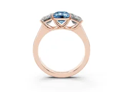 Fancy Blue Emerald Cut Diamond Three-Stone Ring Set in Rose gold with Plain Polished Band