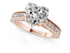 Heart Cut Diamond Solitaire Ring Set in Rose gold with Milgrain-Edged Pavé Band and Prong Setting