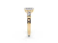 Emerald Cut Diamond Five-Stone Prong Set Engagement Ring Set in Yellow gold with Channel Band
