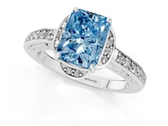 Fancy Blue Radiant Cut Diamond Halo Ring Set in Platinum with Channel Set Band and Prong Setting