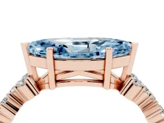 Fancy Blue Marquise Cut Diamond Ring Set in Rose gold with Scattered Round Accents