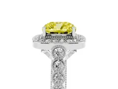 Fancy Yellow Cushion Cut Diamond Milgrain Halo Solitaire Ring Set in Platinum with Bezel Set Side Stones and Pavé Band
