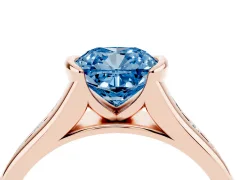 Fancy Blue Cushion Cut Diamond Bezel-Set Solitaire Ring Set in Rose gold with Channel-Set Band