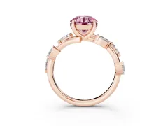 Fancy Pink Round Cut Diamond Solitaire Ring Set in Rose gold with Twisted Marquise Accent Band