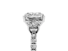 Asscher Cut Diamond Three-Stone Ring Set in White gold with Pavé Band and Graduated Sides