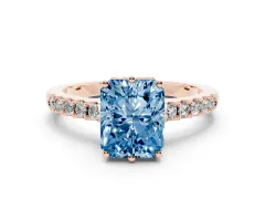 Fancy Blue Radiant Cut Diamond Solitaire Engagement Ring Set in Rose gold with Pavé Band and Prong Setting