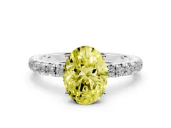 Fancy Yellow Oval Cut Diamond Pavé Solitaire Engagement Ring Set in Silver with Prong Setting