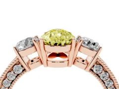 Fancy Yellow Pear Cut Diamond Three-Stone Ring Set in Rose gold with Round Side Stones and Pavé Band
