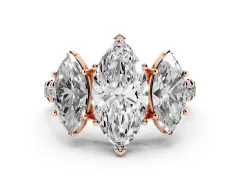 Marquise Cut Diamond Three-Stone Ring Set in Rose gold with Pavé Band