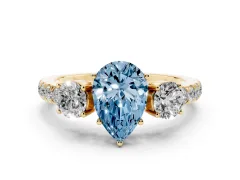 Fancy Blue Pear Cut Diamond Three-Stone Ring Set in Yellow gold with Round Side Stones and Delicate Pavé Band