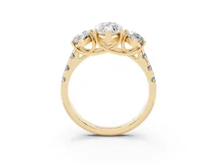 Marquise Cut Diamond Three-Stone Ring Set in Yellow gold with Pavé Band