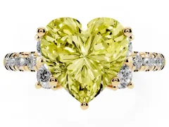 Fancy Yellow Heart Cut Diamond Three-Stone Pavé Ring Set in Yellow gold with Prong Setting