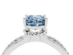 Fancy Blue Oval Cut Diamond Solitaire Ring Set in Platinum with Channel Set Band and Prong Setting