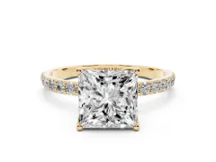 Princess Cut Diamond Solitaire Engagement Ring Set in Yellow gold with Round Pavé Band and Prong Setting