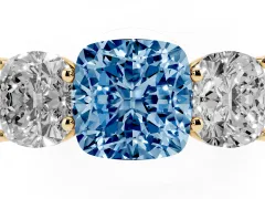 Fancy Blue Cushion Cut Diamond Three-Stone Ring Set in Yellow gold with Plain Polished Band