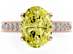 Fancy Yellow Oval Cut Diamond Solitaire Ring Set in Rose gold with Milgrain-Edged Pavé Band and Prong Setting