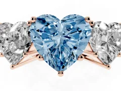 Fancy Blue Heart Cut Diamond Three-Stone Ring Set in Rose gold with Textured Band