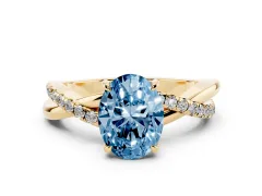 Fancy Blue Oval Cut Diamond Twisted Pavé Band Ring Set in Yellow gold with Prong Setting