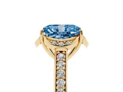 Fancy Blue Radiant Cut Diamond Halo Ring Set in Yellow gold with Channel Set Band and Prong Setting