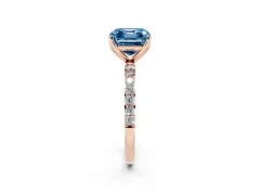Fancy Blue Asscher Cut Diamond Solitaire Engagement Ring Set in Rose gold with Round Pavé Band and Prong Setting
