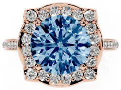 Fancy Blue Round Cut Diamond Halo Ring Set in Rose gold with Pavé-Lined Shoulders and Prong Setting