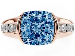 Fancy Blue Cushion Cut Diamond Bezel-Set Solitaire Ring Set in Rose gold with Channel-Set Band